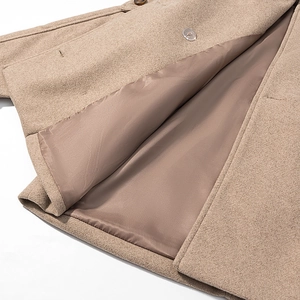 Classic camel wool overcoat with smooth satin lining and textured tailored collar detail