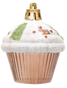 Macro detail of cupcake-shaped Christmas ornament with white glitter frosting and bronze base