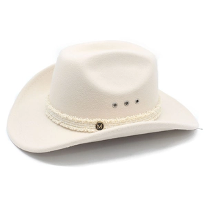 Detail of off-white felt cowboy hat featuring M logo metal plaque and fringe band