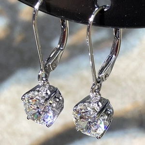 Classic silver copper leverback earrings with four-prong set sparkling zircon stones