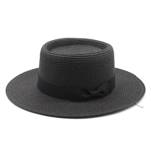 Classic black flat top wide brim straw hat with elegant satin ribbon bow for sun protection