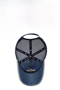 Detail of breathable navy mesh crown and reinforced interior branding on sports cap