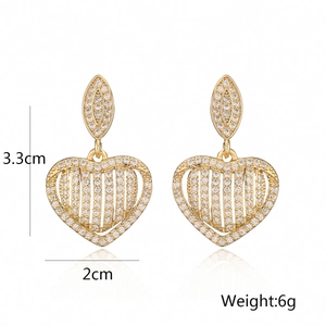Gold plated heart earrings with white zircons, 3.3cm height and 6g weight, front view