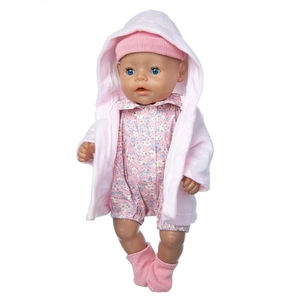 Detail of baby doll set with pink fleece hoodie and blue floral romper on white background
