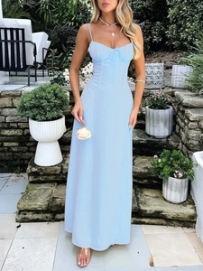 Detail of light blue maxi dress featuring a ruched bust with delicate tie-up detail