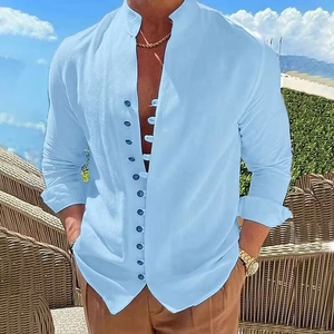Detail of light blue linen shirt featuring a mandarin collar and unique button loop closure