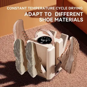 Portable 48°C electric shoe dryer with four foldable arms on a cozy brown rug