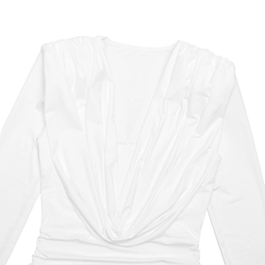 Detailed view of the deep cowl neckline and elegant draped folds on a white long sleeve dress