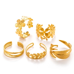 5-piece gold adjustable open cuff bracelet set with flower, leaf, and feather designs