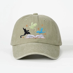 Vintage olive green washed baseball cap with embroidered flying dragons and book design