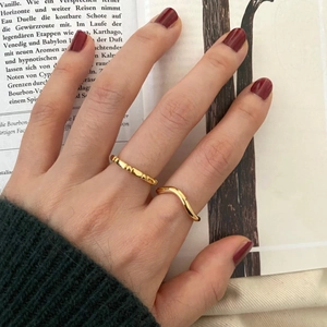 Minimalist gold plated 925 silver ring set featuring wave and bamboo textures for women