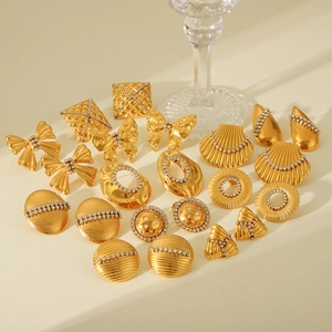 Chic 18K gold plated stainless steel bow and shell drop earrings with sparkling crystals