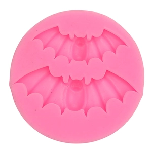 Pink silicone mold featuring dual bat shapes for Halloween fondant and cake decoration