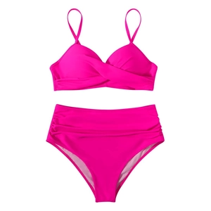 Detail view of hot pink two-piece bikini featuring high waist bottoms and ruched side details