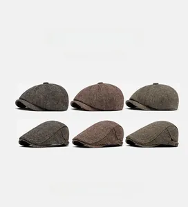 Detailed grid of six classic herringbone tweed newsboy caps in various retro colors