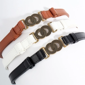 Vintage leather belts with double ring bronze buckles in black, white, and brown