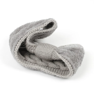 Detail of grey knitted winter headband with fleece lining and thick twisted knot texture