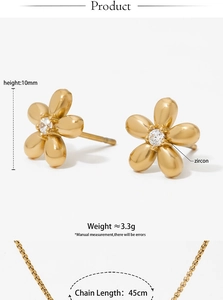 Detail of gold floral jewelry set with 10mm flower earrings and 45cm necklace with zircon