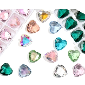 Colorful 12mm heart-shaped crystal glass rhinestones with pointed backs in a storage case