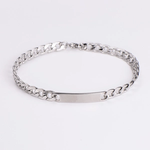 Polished silver stainless steel Cuban link bracelet with a blank rectangular ID plate