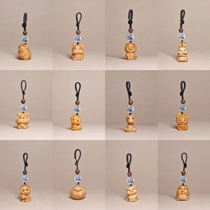 Handcrafted cartoon wooden zodiac keychains set with natural wood grain and fortune beads