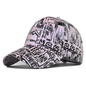 Close-up of pink tie-dye baseball cap with black architectural sketch prints