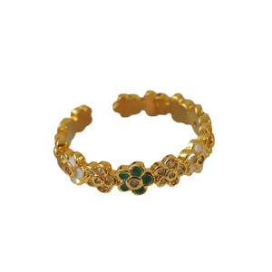 Exquisite gold open ring with green enamel flowers and white crystal petals