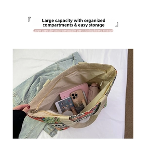 Interior view of floral tote bag showing large capacity for laptop and daily essentials