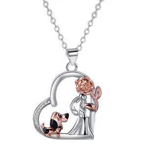 Two-tone heart pendant necklace with rose gold dog and girl holding a rose on silver chain