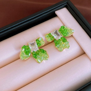 Elegant gold plated butterfly flower stud earrings with green and clear zircon crystals