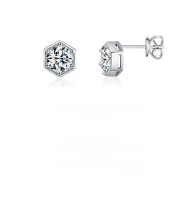 Macro detail of 1ct moissanite S925 silver stud earrings with hexagonal six-prong setting