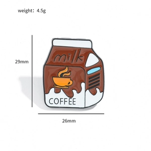 Close-up of coffee milk carton enamel pin showing exact dimensions of 29mm by 26mm