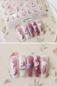 Detail of 3D embossed floral nail stickers featuring purple flower patterns and petals