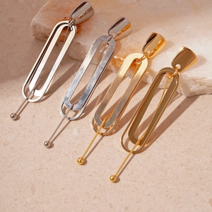 Modern double oval geometric drop earrings in gold and silver finish with fine chain details