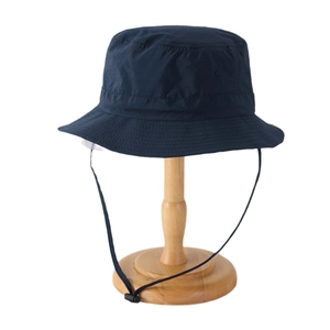 Quick-dry navy blue sun hat for hiking and fishing with adjustable wind cord on wood stand