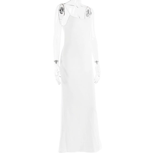Detailed view of white slip dress with thin straps and a slim silhouette design