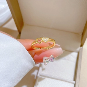 Adjustable gold plated ring with hollow heart and zircon pavé design for women