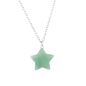 Detailed view of a green natural stone star pendant on a delicate silver chain necklace