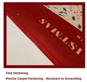 Detailed close-up of the durable stitched edges on the festive red Christmas floor mat