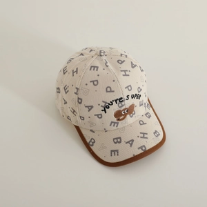 Detailed close-up of elephant embroidery and letter printing on children's baseball cap