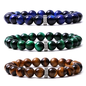 Natural tiger eye stone beaded bracelets in brown, green, and blue with metal charm