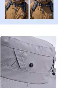 Detail of grey outdoor sun hat showing breathable eyelets and adjustable windproof cord