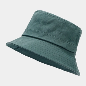 Detail of dark teal cotton bucket hat with reinforced stitching and metal eyelet vent