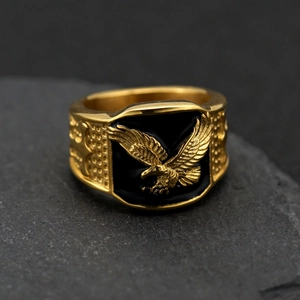 Golden 316L stainless steel signet ring for men featuring a flying eagle and black enamel