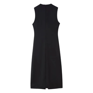 Detail of black sleeveless midi dress showing rear invisible zipper and back slit hem