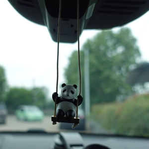 Cute panda swinging on wooden branch car rearview mirror hanging ornament detail view