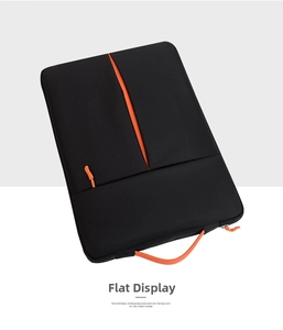 Detail of slim laptop sleeve with orange zipper, handle, and contrast lining display