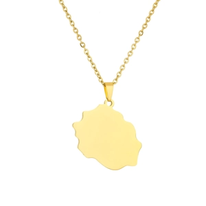 Close-up of golden stainless steel necklace with a polished Reunion Island map pendant