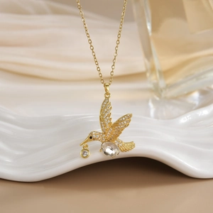 Golden hummingbird pendant necklace with sparkling cubic zirconia stones for women