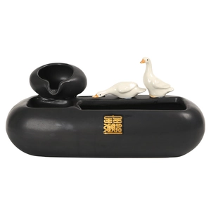 Creative ceramic water fountain desktop ornament with decorative white ceramic ducks